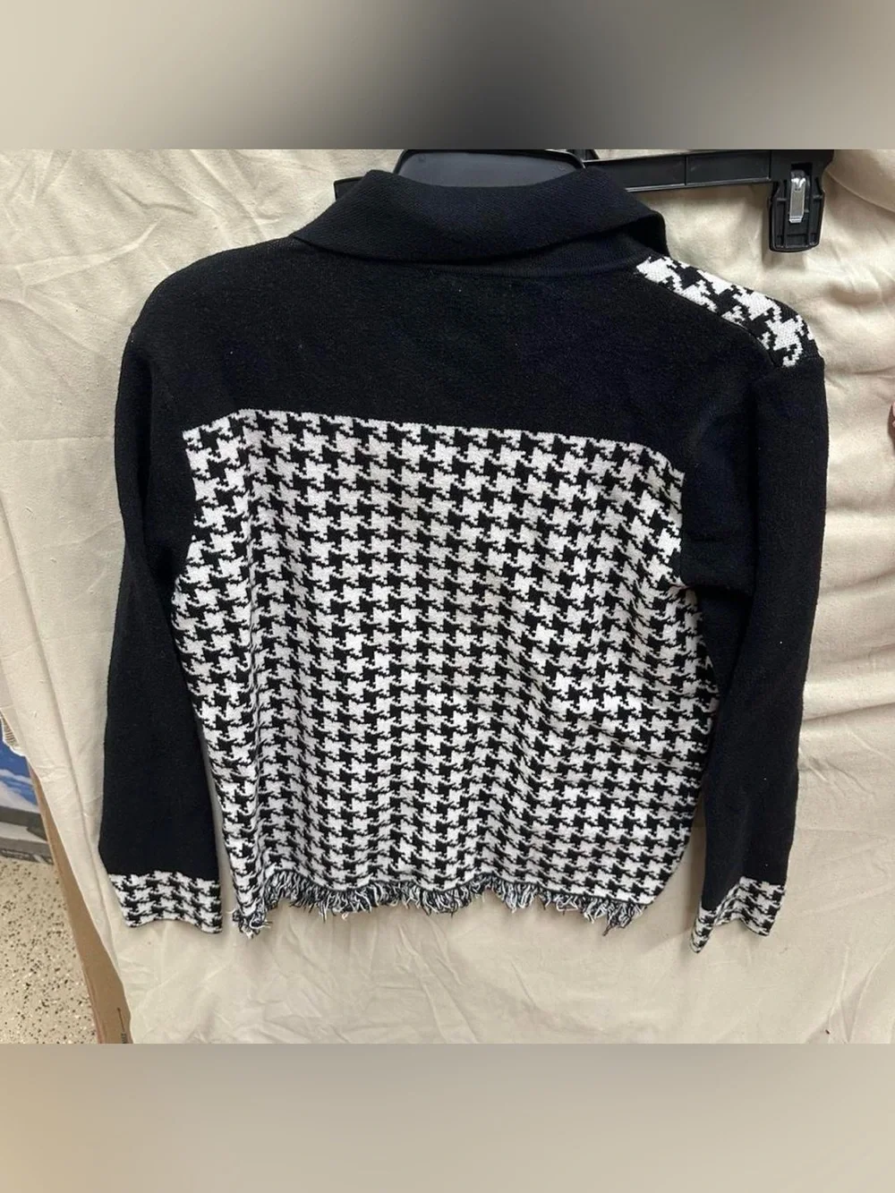 Preppy long sleeve checkered black and white sweater.